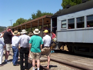 john-and-others-waiting-to-board-train_7469884130_o • <a style="font-size:0.8em;" href="http://www.flickr.com/photos/95000936@N06/48609397388/" target="_blank">View on Flickr</a>
